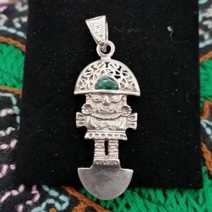 Peruvian tumi in 950 sterling silver and natural turquoise stone